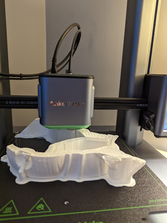 Photo of a 3D print in progress.