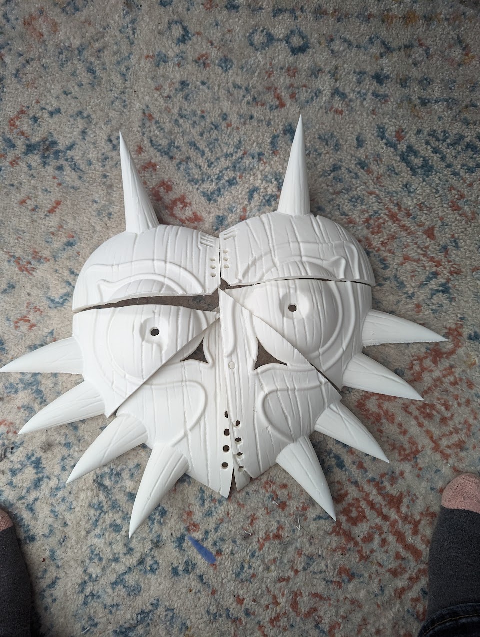 A picture of Majoras Mask, seperated in 6 pieces